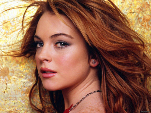 Lindsay Lohan in un servizio fotografico si spoglia per Playboy